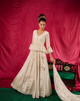 Ivory tissue lehenga with peplum blouse and mukaish organza dupatta - Sohni